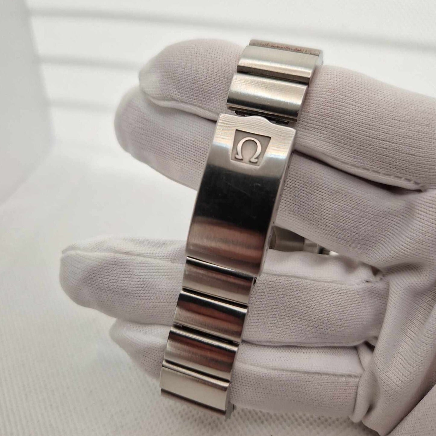 Original stainless steel bracelet/leather strap of the Omega Speedmaster Mark 4.5 Reference 176.0015.