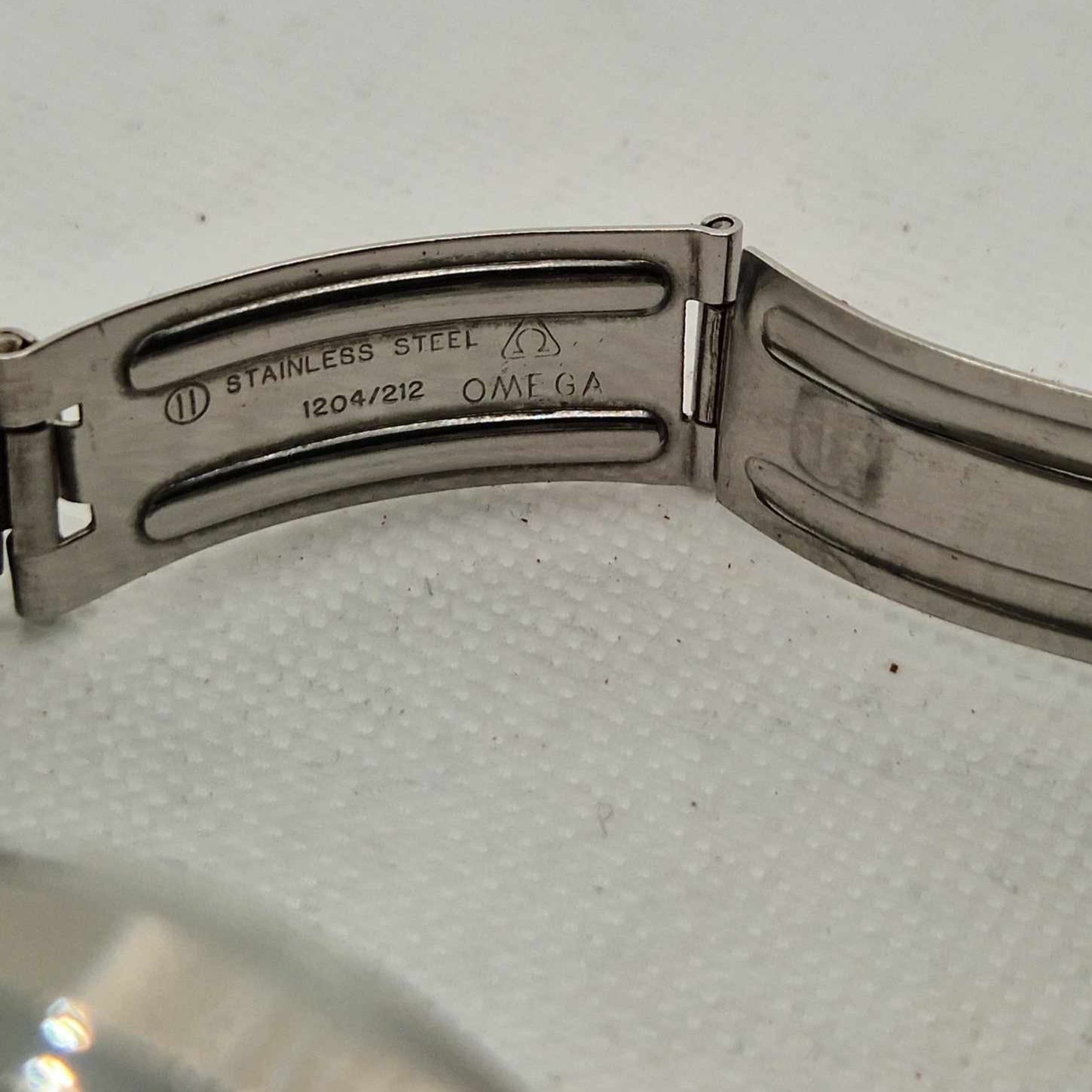 Original stainless steel bracelet with original OMEGA inprints and engravings